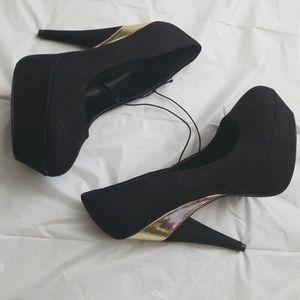 Black suede platform heels